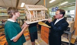 Model students: Western Port Secondary College students Jake Parlberg and Cooper Wood with Greg Hunt. Picture: Yanni