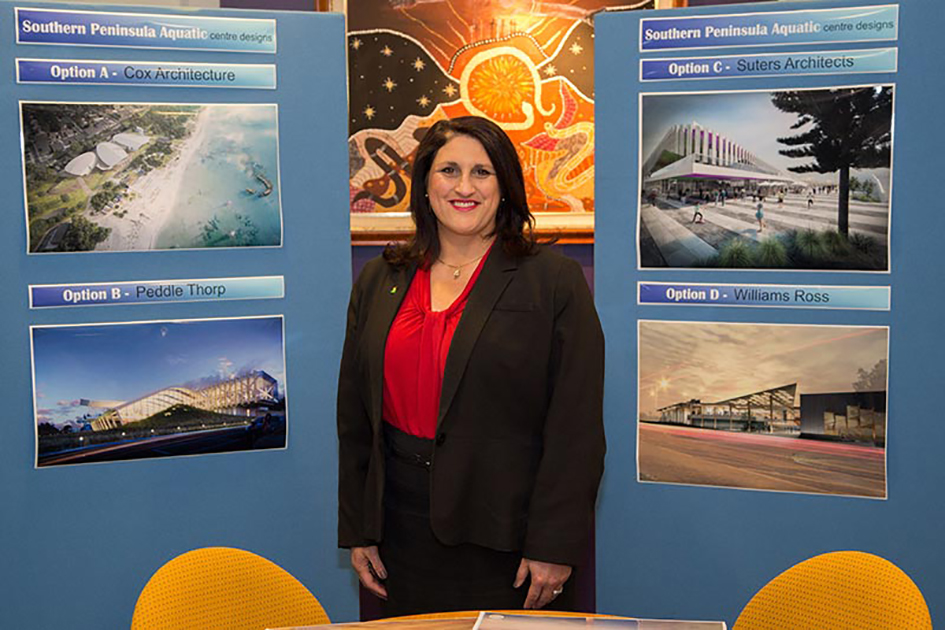 Final phase: Shire mayor, Cr Antonella Celi, unveils the four designs drawn up for the Southern Peninsula Aquatic Centre, which are now on public display. The community is being invited to help select the winning design.
