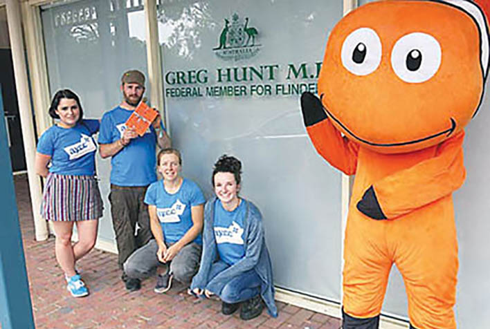 Protected: Summer rains dampened the activities but not the enthusiasm of anti-coal mining protesters Erica Ransley, Andy Snook, Hannah Glasson, Maxine Gigliotti and Raf Branton (in the Nemo costume). The five members of the Australian Youth Climate Coalition sought refuge and a photo opportunity outside the office of Flinders MP Greg Hunt.