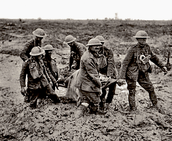 The mud made life difficult for everybody at Passchendaele. Stretcher bearers struggle through.