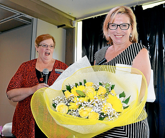 From the heart: Rosie Batty receives a bouquet of flowers by VIEW’s national president Robin Perros.