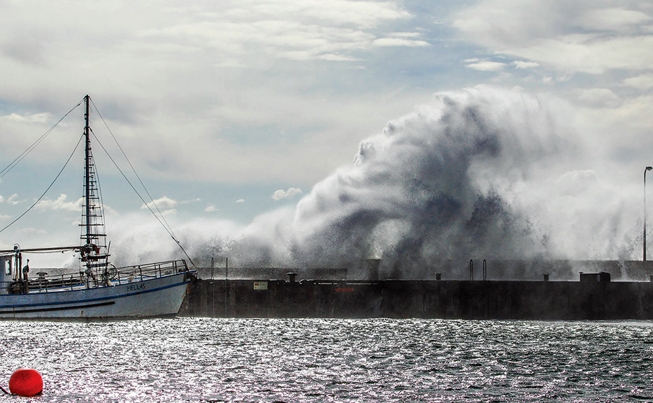 Pier awash: Waves crash over Mornington pier during strong winds on 6 May. Picture: Jai Just All Images