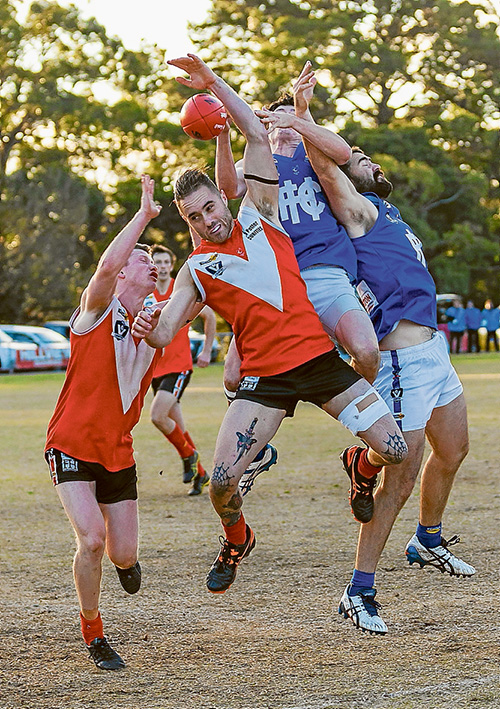 Hands up if you’d like the ball: Hastings dominated Red Hill to win by 32 points. Picture: Andrew Hurst