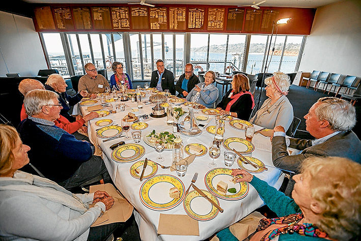 Memories sail back: Foundation member Joan Akland (blue/green cardigan), Alice Vaughan (blue jumper), member Kevin Willey (navy jacket) and Jack Bean (red Jumper) at the Mornington Yacht Club lunch. Picture: Yanni
