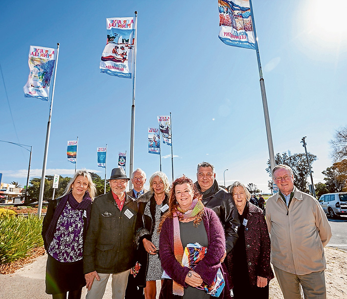 Flag raising: At the unfurling of the flag at Rye are, from left, Lynette Edwards, Michael Leeworthy, Peter Houghton, Sabra Lazarus, Jo Ridgeway,Miodrag Jankovic, Mechelle Cheers and Hugh Fraser.  Picture: Yanni