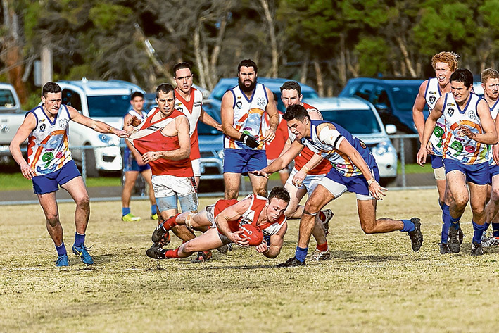 Four quarter effort: Red Hill got down and dirty to get up over Hastings and keep its Nepean League finals chances alive. Picture: Andrew Hurst