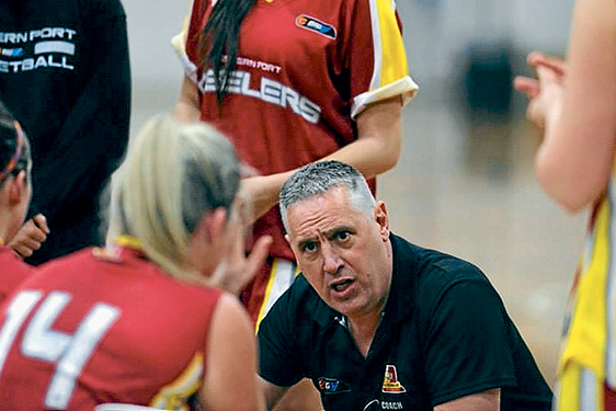 Giving advice: Western Port Lady Steelers coach Andrew Jacobson during the team’s first appearance in Division 1.