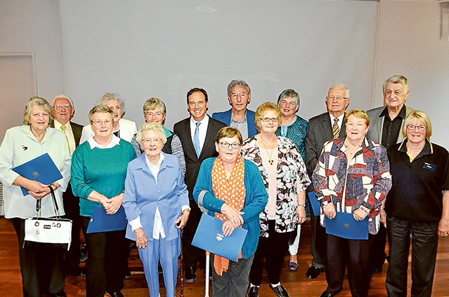 Stalwarts: Fourteen of the 15 recipients of 2015 Flinders Seniors Awards with Flinders MP and environment minister Greg Hunt (centre back row in suit). Picture supplied
