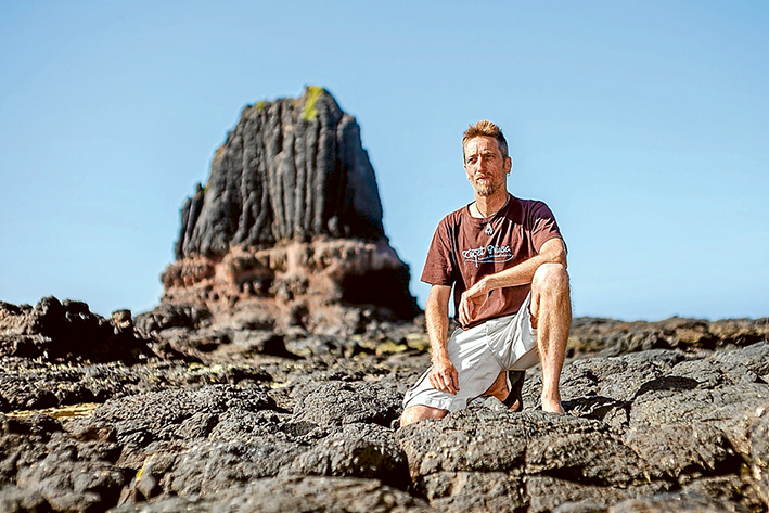 Pride of place: Photographer Matt Mackay at Pulpit Rock, Cape Schanck, one of his favourite places on the Mornington Peninsula which features in his 2016 calendar. Picture: Yanni