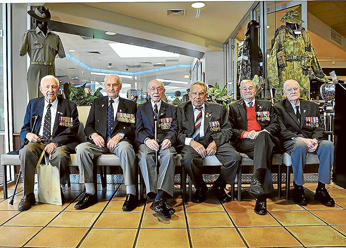 Anzac spirit: Rye RSL veterans Jack Lever (Army), Ken Gibson (Army), Stan Price (RAN), Les Butler (Army), Len Rowler (RAN) and Ray Ruby (Army) take their places for a photographic tribute.