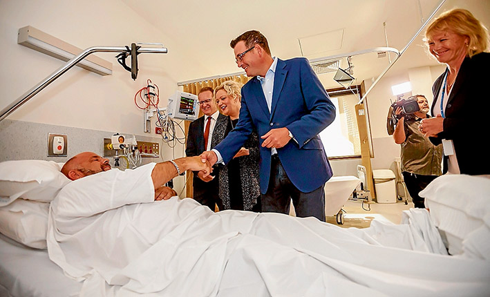 Helping hand: Premier Daniel Andrews, right, talks to cardiac patient Mark Meaney from Rosebud, with Frankston MP Paul Edbrooke and Health Minister Jill Hennessy at Frankston Hospital’s new Rapid Assessment Chest Pain Unit. Picture: Yanni