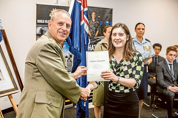 Duntroon calling: Army recruit Catherine Brace receives her certificate of recognition from land systems head Major General David Coghlan before heading off to the Royal Military College, Duntroon. 