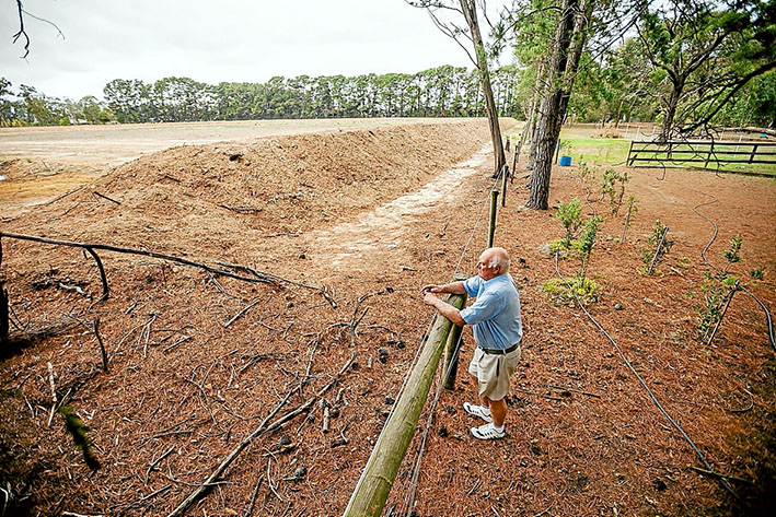 Big picture: Tyabb Residents Group spokesman Alan Robinson casts a critical eye over the Bayport quarry operations. Picture: Yanni