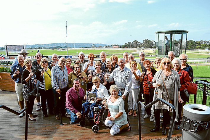 To their Belle: Beleura Village residents, above, toast the much-loved filly’s success at Mornington, Monday.