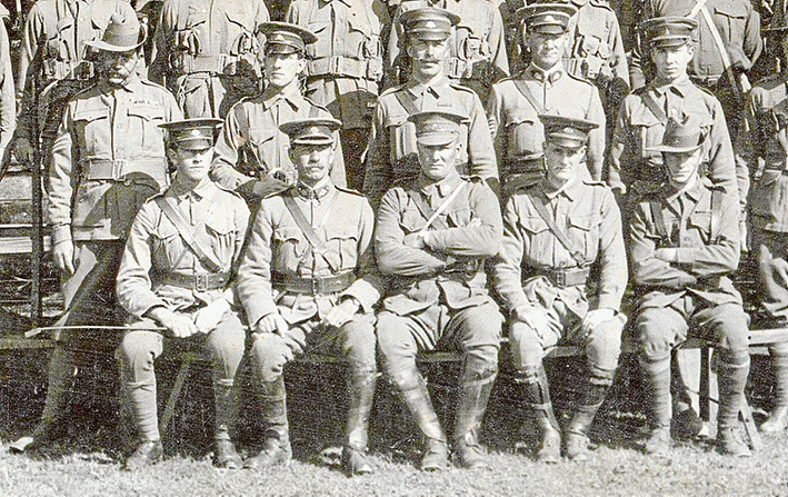 Officers and NCO’s of the 7th Infantry Battalion HQ with Pompey Elliott seated in the centre.