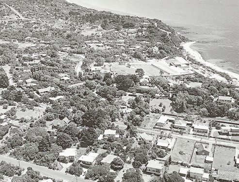 Growing days: Part of Ranelagh Estate from the air in the 1970s shows new houses and the Ranelagh Club above the beach. Picture supplied