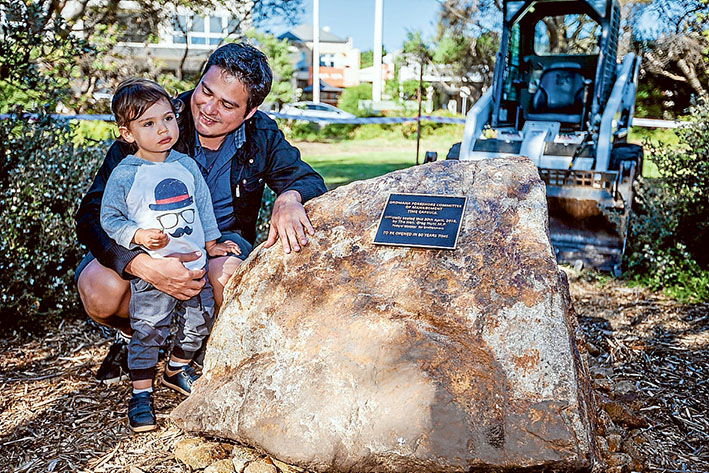 Rock of ages: Rafael Acosta and son Henry ponder the next 50 years – when the Dromana time capsule will be opened. Pictures: Yanni