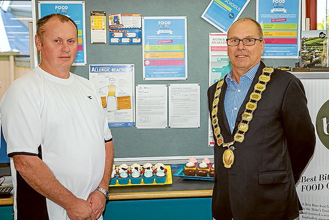 Allergy display: Paul Phillips, of T-Rose artisan bakery, Tyabb, with the mayor Cr Graham Pittock at the Food Allergy Awareness display, Hastings library. Food Allergy Week runs 15-21 May.