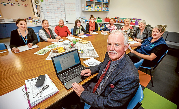 Improving literacy: Richard Mucha and the principal team from Hastings primary schools get together regularly to talk about linking literacy and learning. Picture: Yanni