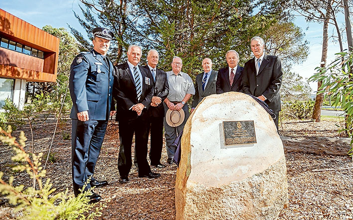 Stone unveiled: Superintendent Shane Pannell, Blue Ribbon Foundation Mornington Peninsula branch president Darryl Nation, with former colleagues of Senior Constable Kevin Laube: Terry Mountain, ‘Bluey’ Waugh, Bob Hill, John Welsh and Bob Bodycomb. Picture: Yanni