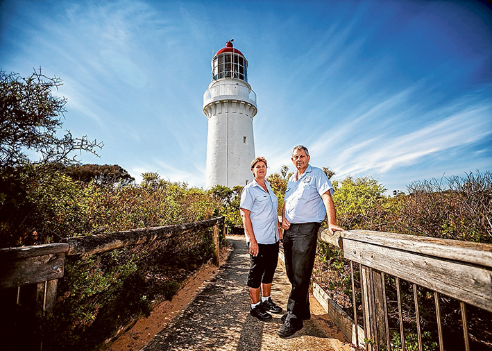 The long goodbye: Lighthouse keepers Tony and Prue Sheers bid farewell after two decades manning the light. Picture: Yanni