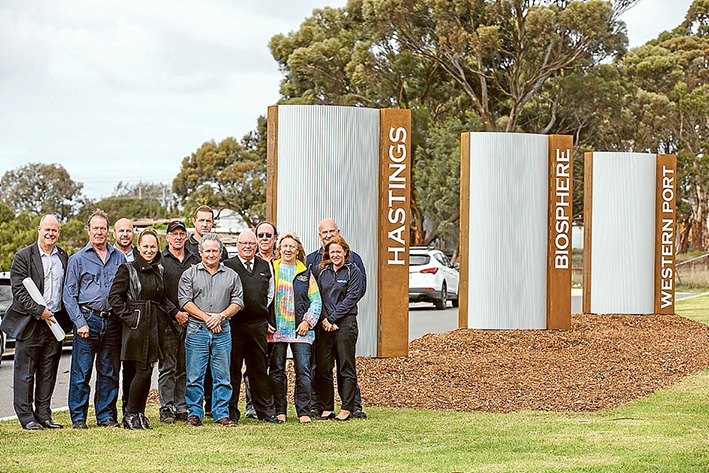 Signed up: Some of those involved with producing the new sign on Marine Pde leading into Hastings, from left, David Garnock, Ray Francis, James McNeur, Angie Baker, Dirk Rynaard, Craig Rynaard, Bryan Stone, Chris Watt, Mark Birtles, Del Skinner, Ron Bange and Amanda Burston. Picture: Supplied