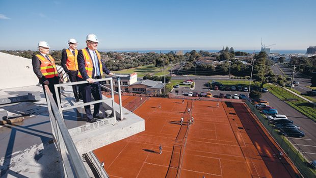 Holding high court: (from left) State Liberal MP Neale Burgess, State Liberal candidate for Frankston Simon Armistead and Health Minister David Davis look out over Frankston from a four-storey addition to Frankston Hospital. Picture: Yanni