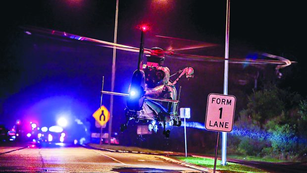 The airlift leaves the scene of the Western Port Highway crash. Picture: Gary Sissons