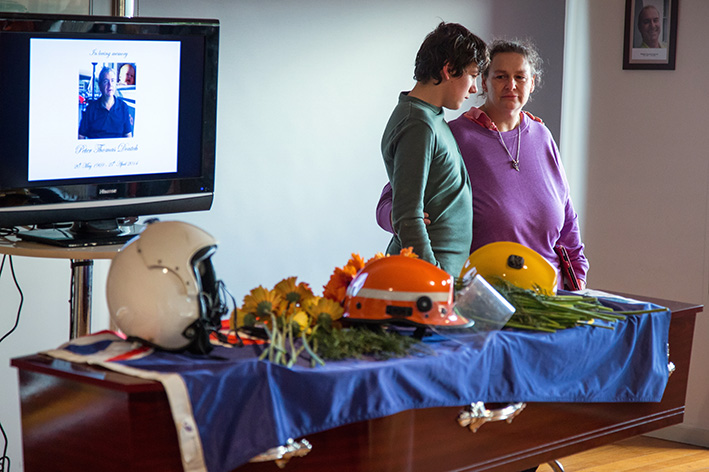 Many hats: Peter Doutch’s wife Susan and son Daniel will always remember his devotion to his family, dedication to the SES and CFA, and passion for flying and singing. Picture: Gary Sissons