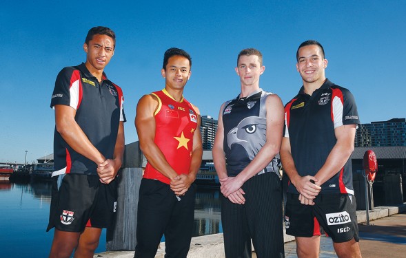 Game on: St Kilda International Scholarship holder Joe Baker-Thomas, Chinese player Ming Yang, New Zealand player Aaron Harris and St Kilda player Shane Savage.