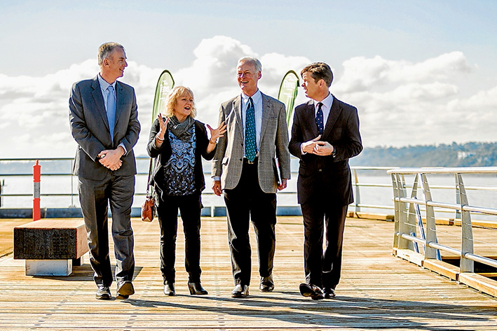 Peer talk: On the almost-completed Mornington pier last week are, from left, acting Parks Victoria CEO Chris Rose, Mornington Peninsula Shire mayor Cr Bev Colomb, Parks Victoria board chairman Andrew Fairley and Ports Minister Luke Donnellan. Labor and Liberal governments have put almost $19 million into rebuilding the structure over five years. Picture: Yanni