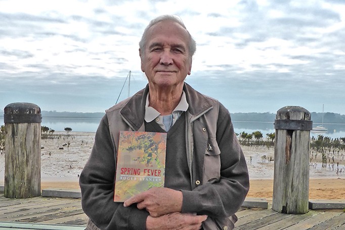 Write approach: Roger Stanley with his first novel Spring Fever. Picture: Fran Henke