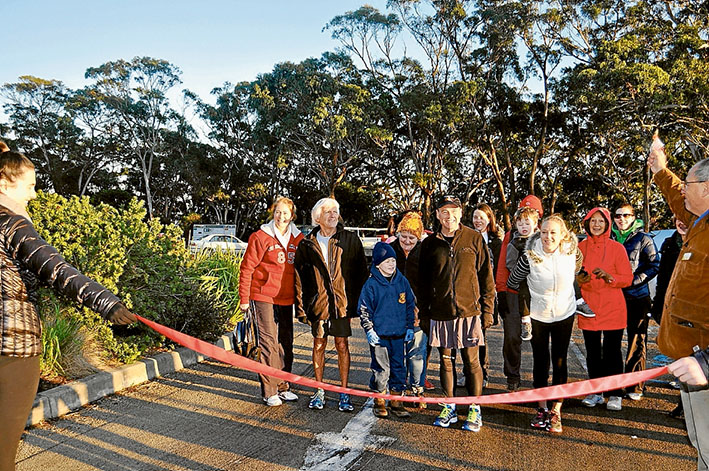 Summit start: Greg Hunt and supporters set off from the top of Arthurs Seat to walk 500 kilometres around his electorate, raising money for charity and awareness of autism. Picture supplied