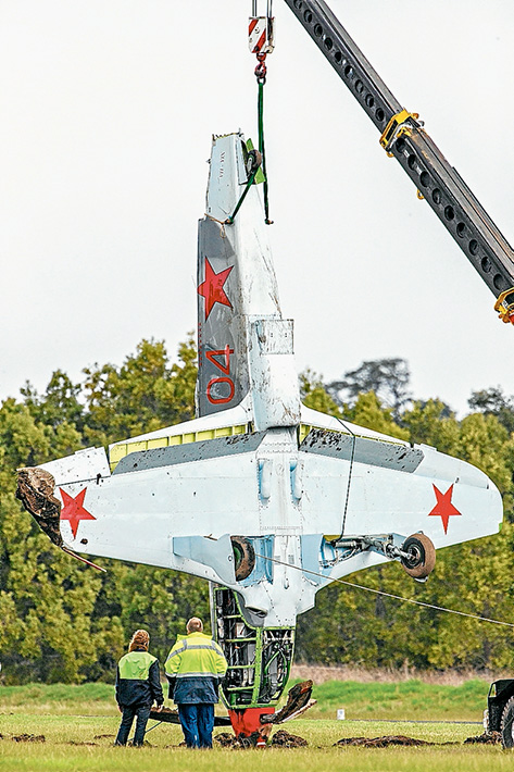 Off runway: The Yak 9 which flipped after landing at Tyabb airfield on Sunday. No one was injured in the crash. Pictures: Gary Sissons