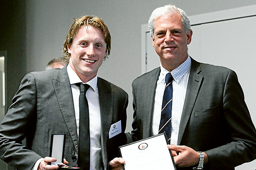 Young gun: Matson Lawson (class of 2010) was the youngest former Peninsula School student inducted into the hall of fame, and received his award from TOPSA committee member Lachlan Patton. Lawson represented Australia in backstroke at the 2012 London Olympics and won his first Australian title in the 200m backstroke in 2013. Picture supplied