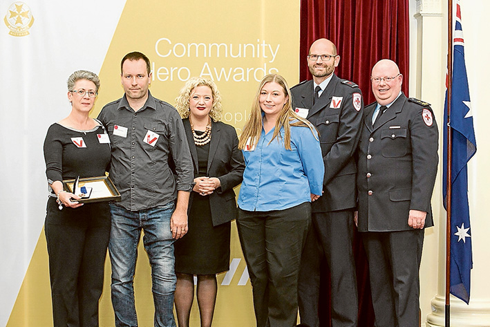 Heros honoured: Pamela Boyle, left, at the bravey awards with Cameron Walker, Ambulance Services minister Jill Hennessy, call taker Hilary Gregson, paramedic Adam Pepper and Acting Ambulance Victoria CEO Tony Walker.