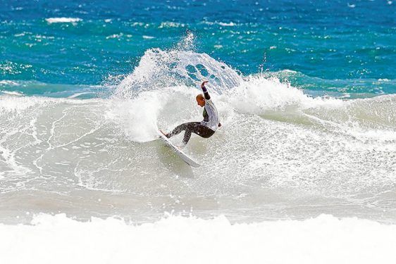 Choppy stylists: Despite the chop, Georgia Fish, above, and Caiden Fowler, below, make the most of their heats at Phillip Island.