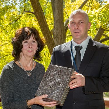 Happy returns: Robbery victim Maree Brann and Detective John Melhuish with the recovered jewellery box. Picture: Gary Sissons