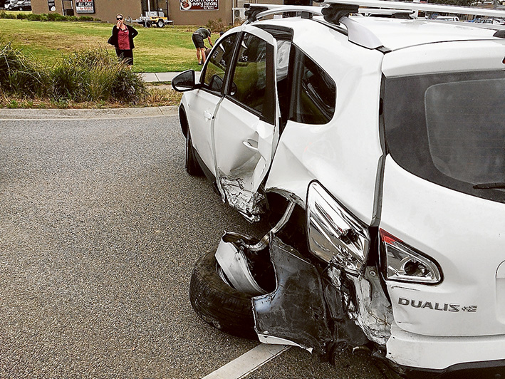 Off the road: Michelle Sheridan’s now unrecognisable seven-seater is probably the only thing that saved her when her car was struck at the lights in Cranbourne-Frankston Rd in December.