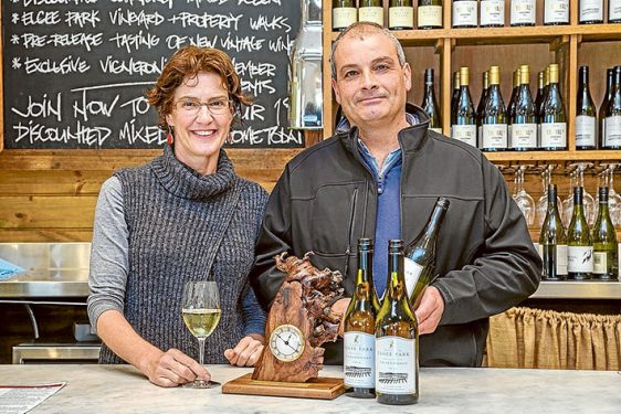 Peninsula Wine Show Winners. Photo: L-R Judy Gifford and Laurence Tedesco inside Merricks General Store with his winning wine.