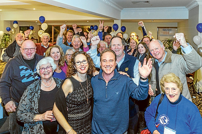 GREG Hunt and his wife Paula were surrounded by jubilant supporters soon after early counting showed he had been re-elected as MP for Flinders. Picture: Gary Sissons