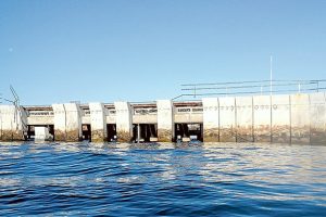 Under repair: Slabs of concrete have been dislodged from Mornington pier, above (Picture: Bill Robinson), which has been closed to the public until further notice, below. (Picture: Jarryd Bravo)