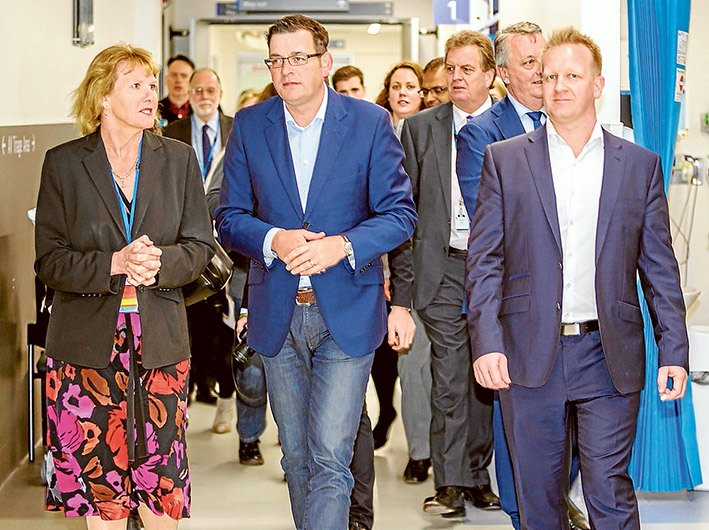 Suicide not painless: Frankston Hospital CEO Sue Williams, left, gives Premier Daniel Andrews and MP Paul Edbrooke, right, at Frankston Hospital last week. Picture: Yanni