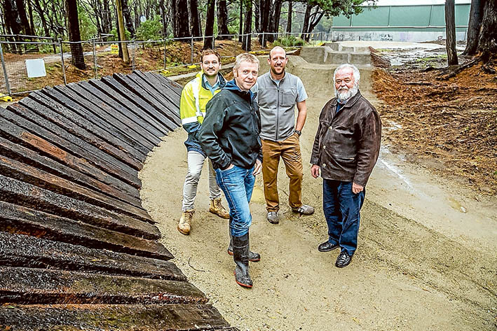 Bikers’ delight: Design engineer Tom Haines-Sutherland, Red Hill Riders Mark Gardner and Rhys Dowsett, and Cr Tim Wood, at the new bike park. Picture: Yanni