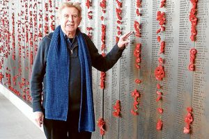 Peter Munro beside the Rolls of Honour at the Australian War Memorial, Canberra, including the names of the three “Sorrento Boys”.