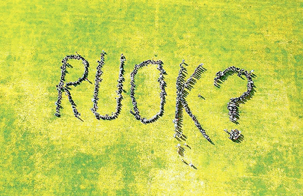 Strong message: Western Port Secondary College students form an RUOK? sign on the oval.