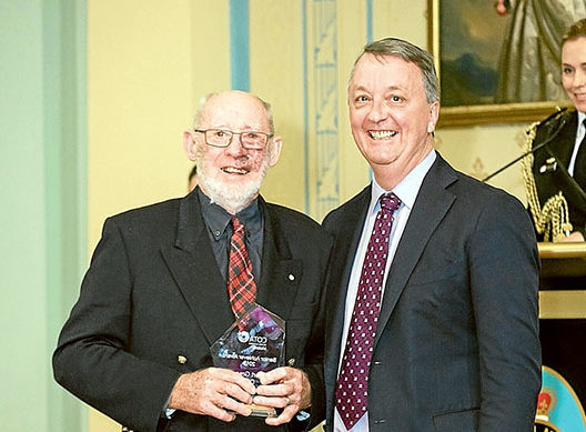 Gong getters: Mt Eliza resident Bob Greaves received a Council of the Ageing Senior Achiever Award from Housing Disability and Ageing Minister Martin Foley at a ceremony at Government House last week. Verna Phillips, of Carrum Downs, received a Veteran Community Award from Governor of Victoria, Linda Dessau AM.