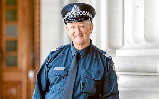 All smiles: Sergeant Bruce Buchan looks back on a career of service as part of the Victoria Police force.