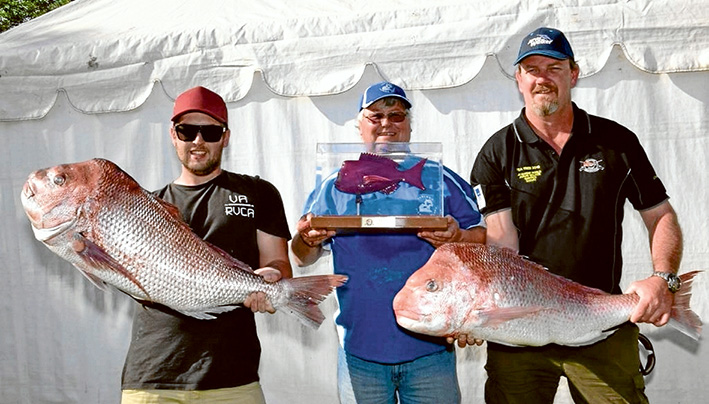 Weighing in: Contest runner-up Jake Milligan, left, with 2016 Victorian Amateur Snapper Champion Harry Sellers holding his trophy and Snapper Point Angling Club president Daniel Rand. Pictures: Supplied and Gary Sissons