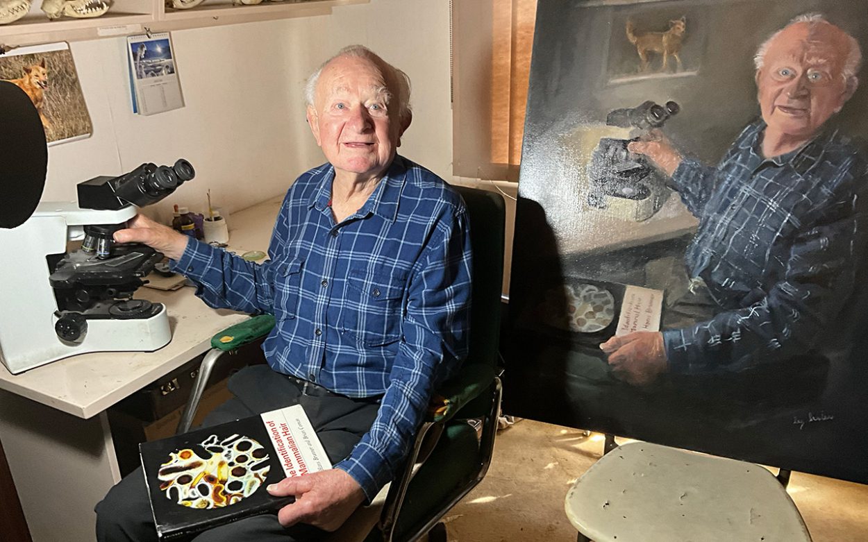 HANS Brunner with the portrait of him by Lulu Clifton-Evans. Picture: Supplied